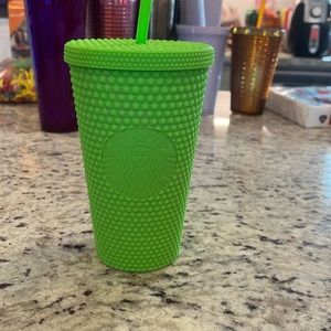 Lime green grande Starbucks cup